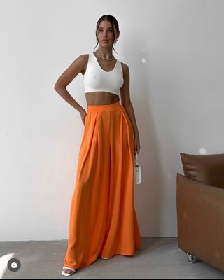Жіночі помаранчеві широкі брюки 1749 фото