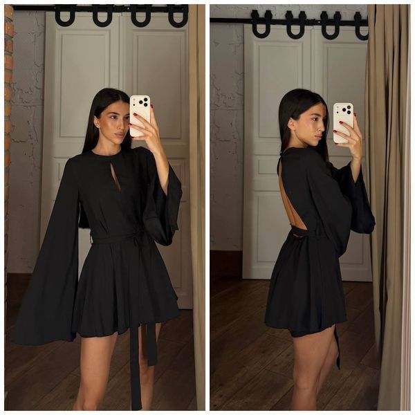 Женский черный комбинезон из короткой юбки-шорт и открытой спиной 2644-3 фото